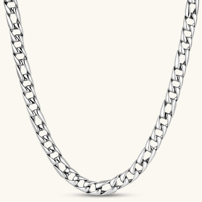 Chunky antique silver plated eco-brass curb chain necklace with a lobster clasp and Greek key detail on a cream background.